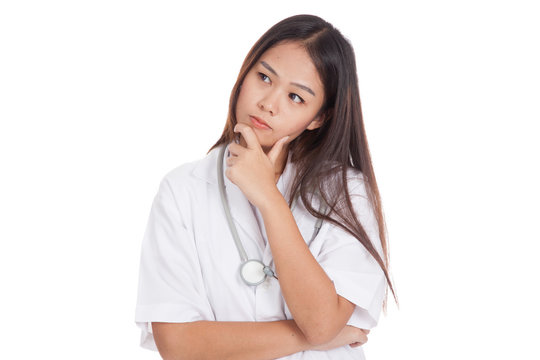 Thoughtful, Young Asian female doctor