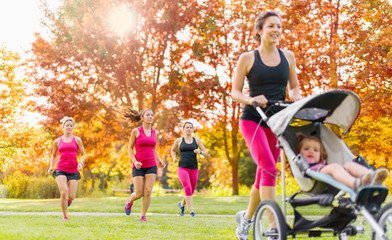 Mother and friends jogging