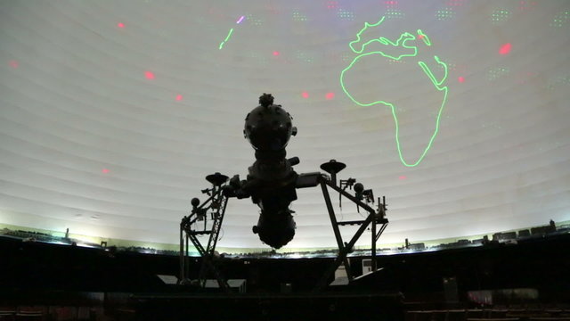 star projector inside a planetarium