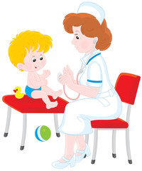 Pediatrician examines a little child