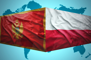 Waving Montenegrin and Polish flags