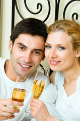 Cheerful couple with champagne