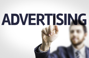 Business man pointing the text: Advertising