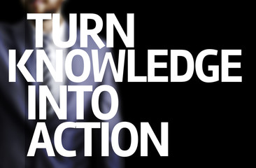 Turn Knowledge Into Action written on a board