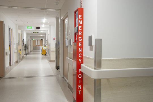 Emergency Point sign in hospital corridor.