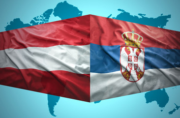 Fototapeta premium Waving Serbian and Austrian flags