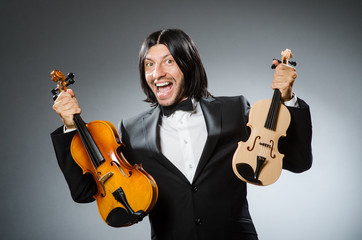 Man violin player in musican concept