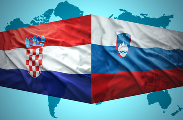 Waving Slovenian and Croatian flags