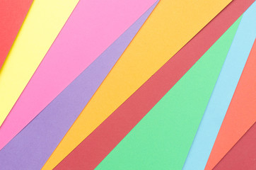 colorful construction paper arranged irregularly  - Powered by Adobe
