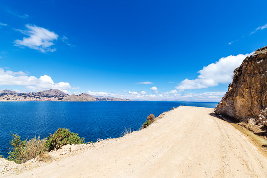 Dirt Road and Lake Titicaca