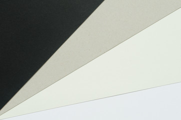 construction paper arranged diagonally from black to white
