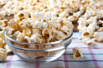 lot of salt popcorn into a bowl