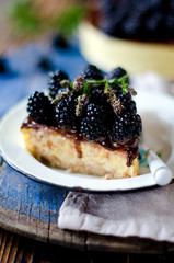 Cheesecake with chocolate and blackberries