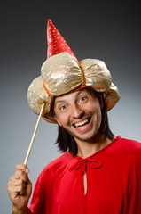Funny wizard wearing red dress
