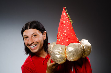 Funny wizard wearing red dress