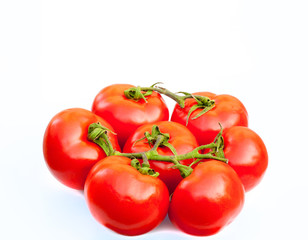 Fresh tomatoes isolated on white