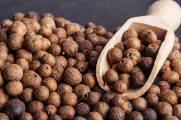 Wooden shovel with  Allspice (jamaica pepper)