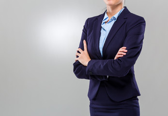 Businesswoman cross arm