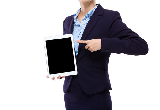 Businesswoman finger point to tablet