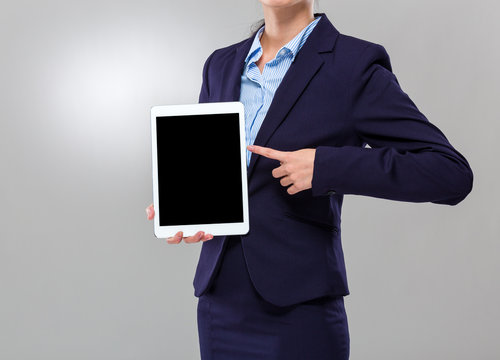 Businesswoman show with blank screen of digital tablet