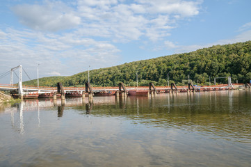 Pontoon bridge across the river in the summer