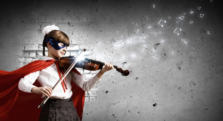 Superkid  playing violin © Sergey Nivens