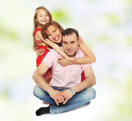 Fototapeta premium The daddy mum and a small charming daughter