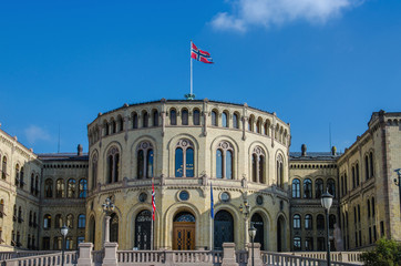 Norwegian parliament (Stortinget) with flag of Norway, Oslo