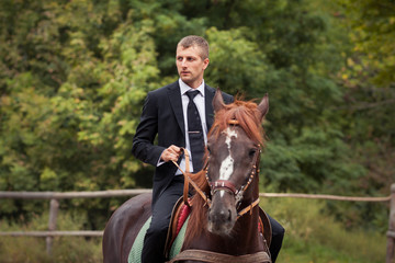 groom on horse