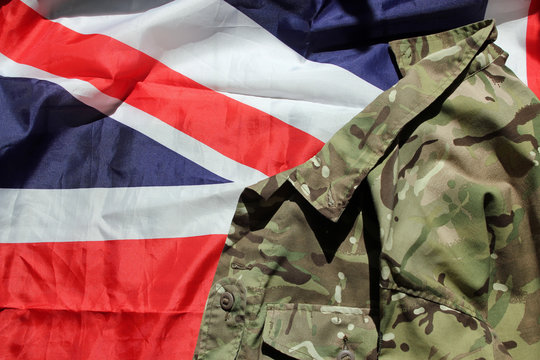 UK military uniform against the Union Flag