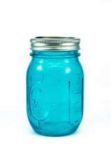 Colored glass bottle isolated on white background