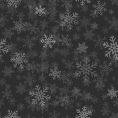 Fototapeta na wymiar Snowflakes on dark background