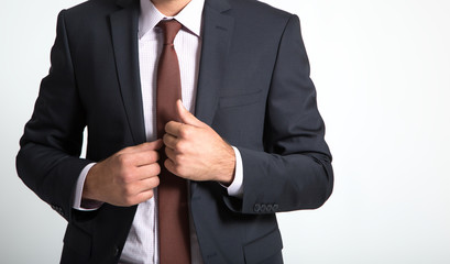 Obraz na płótnie Canvas Businessman wearing suit on white