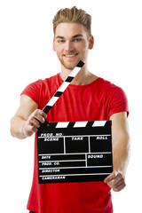 Holding a clapboard