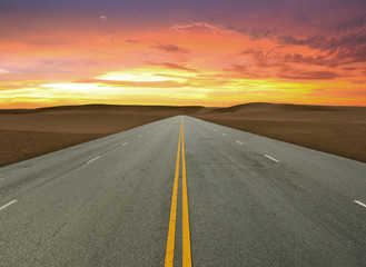 Obraz na płótnie Canvas Road and the sunset sky
