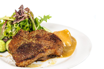 Rump steak with mashed potatoes and mix vegetable on plate