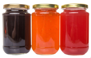 Blueberry, strawberry and orange fruit open lid bottled jam 