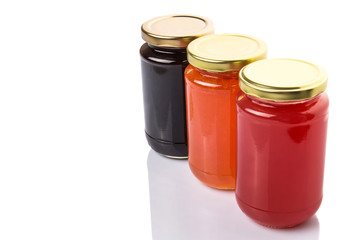 Blueberry, strawberry and orange fruit open lid bottled jam 
