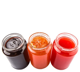 Blueberry, strawberry and orange fruit open lid bottled jam 