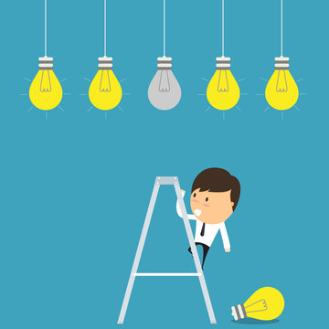 Businessman Change Light Bulb. Concept Of Change Idea.