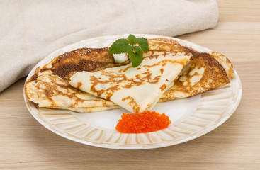 Pancakes with red caviar