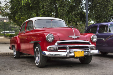 Classic red american car in Havana, Cuba