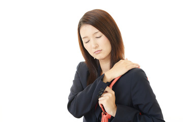 肩痛を訴える女性