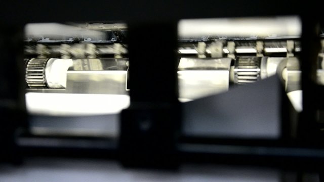 closeup of offset machine into print-shop