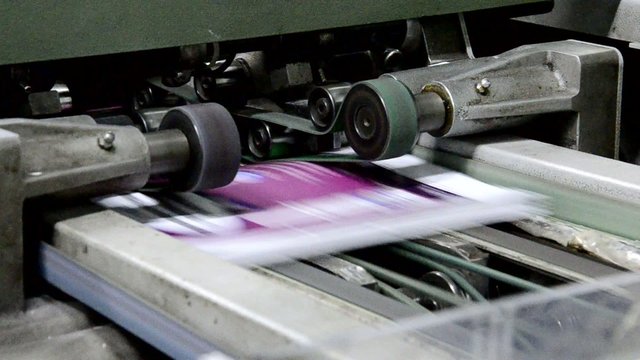 magazine line collecting after passing the press rollers