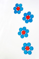 circle plastic pieces in the flower shape
