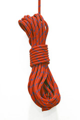 Braided rock climbing rope in coil