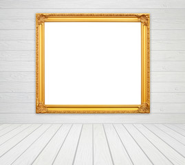 Fototapeta na wymiar blank golden frame in room with white wood wall and wood floor