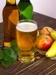Glass and bottles of cider