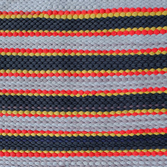 carpet background or texture with stripes in many colors